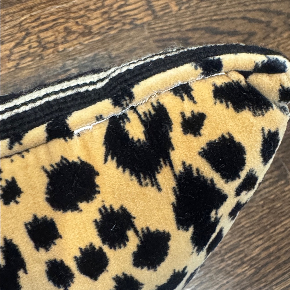 Needle point dog lover pillow with velvet leopard backing 
What part of woof - Picture 3 of 3